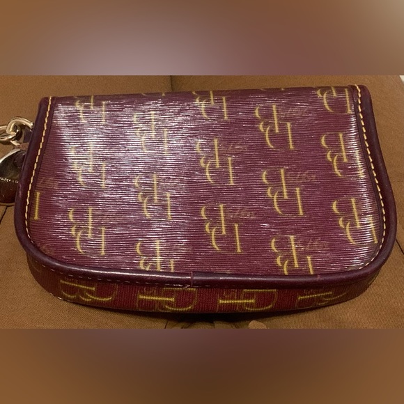 Dooney & Bourke Burgundy Signature
Leather & Canvas Flap Wristlet - Picture 3 of 8